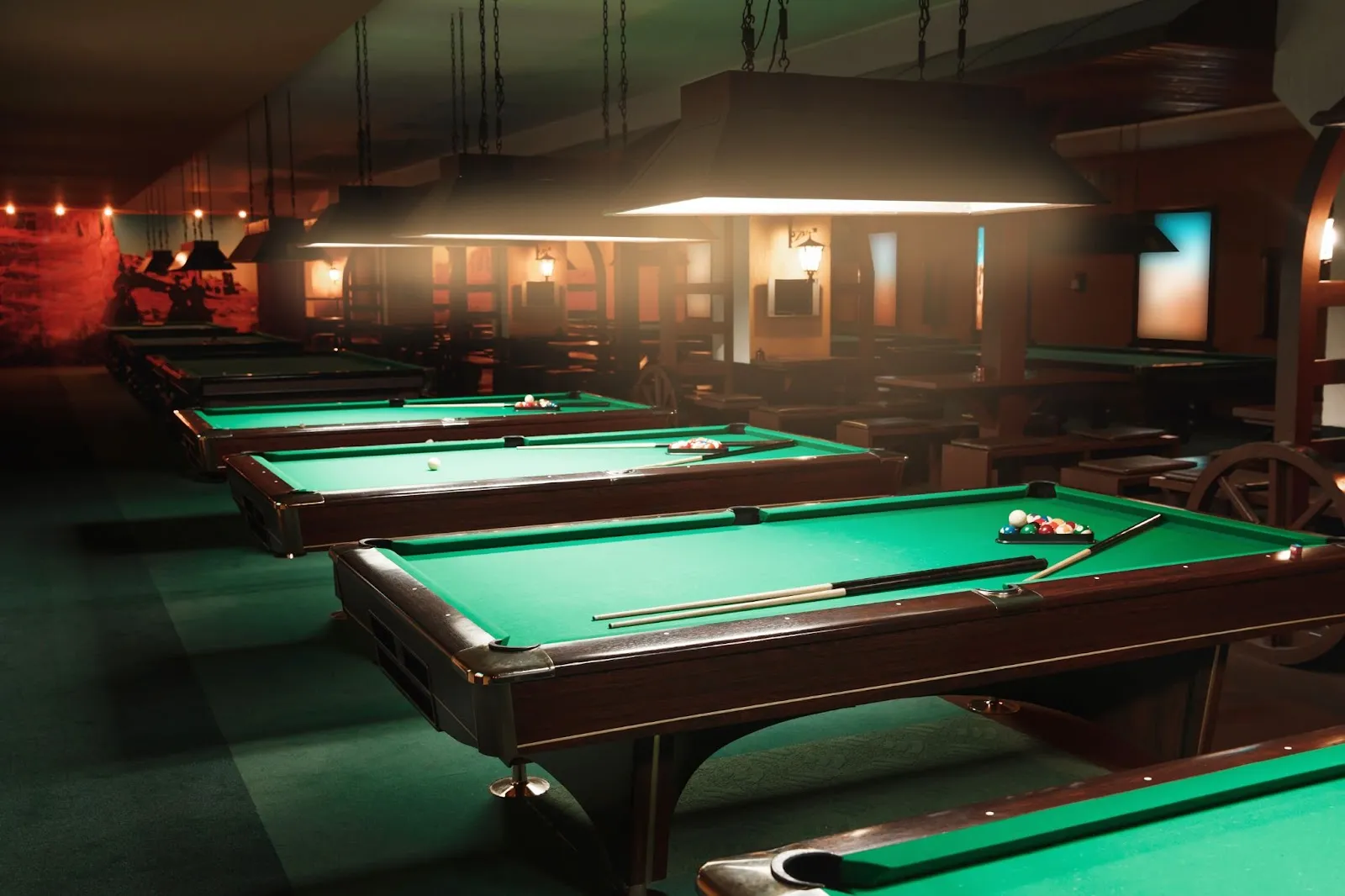 A green pool table, essential for mastering billiards.