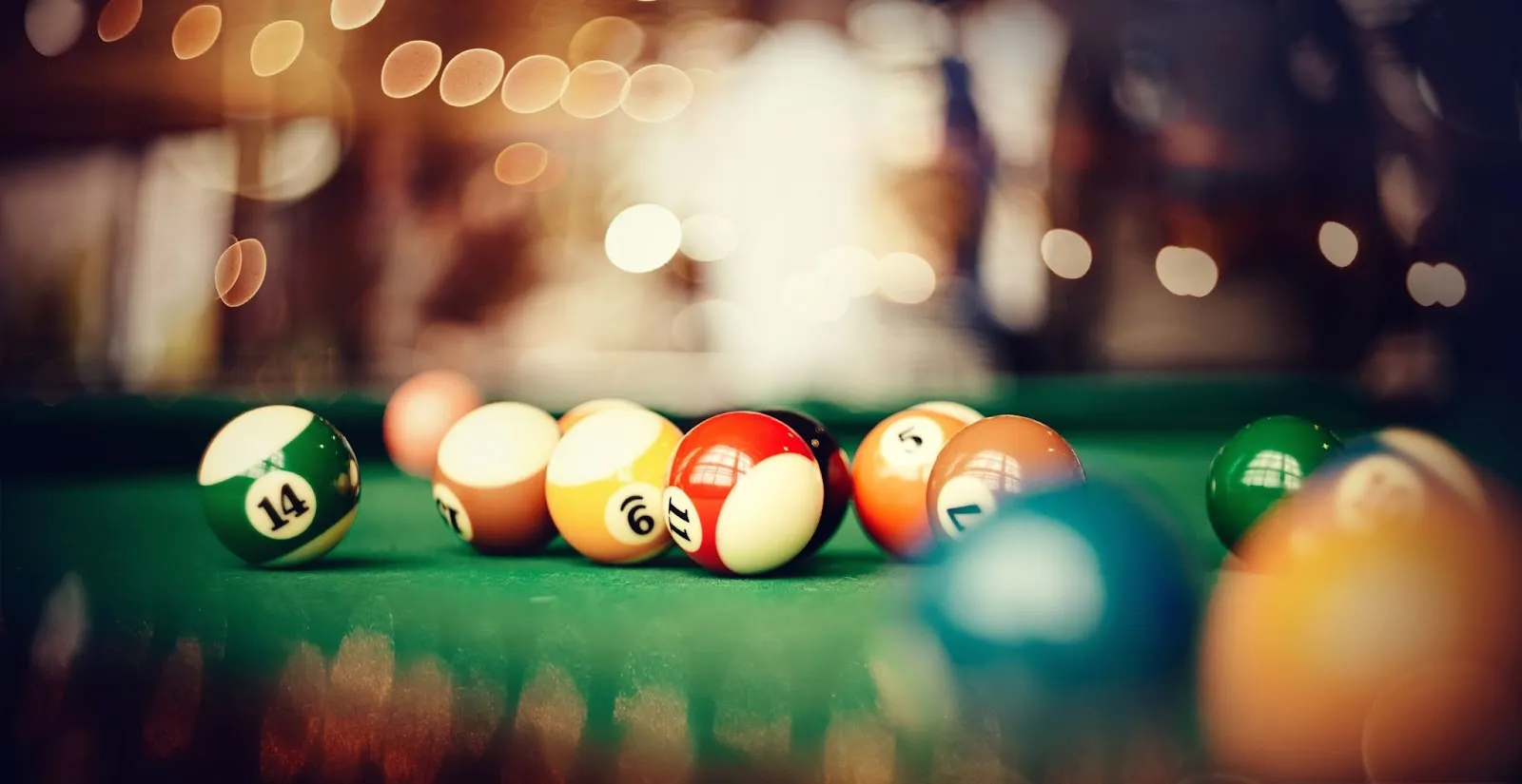 Billiards balls arranged on a pool table, showcasing mastering billiards skills by a dedicated player. Billiards balls arranged on a pool table, showcasing mastering billiards skills by a dedicated player.