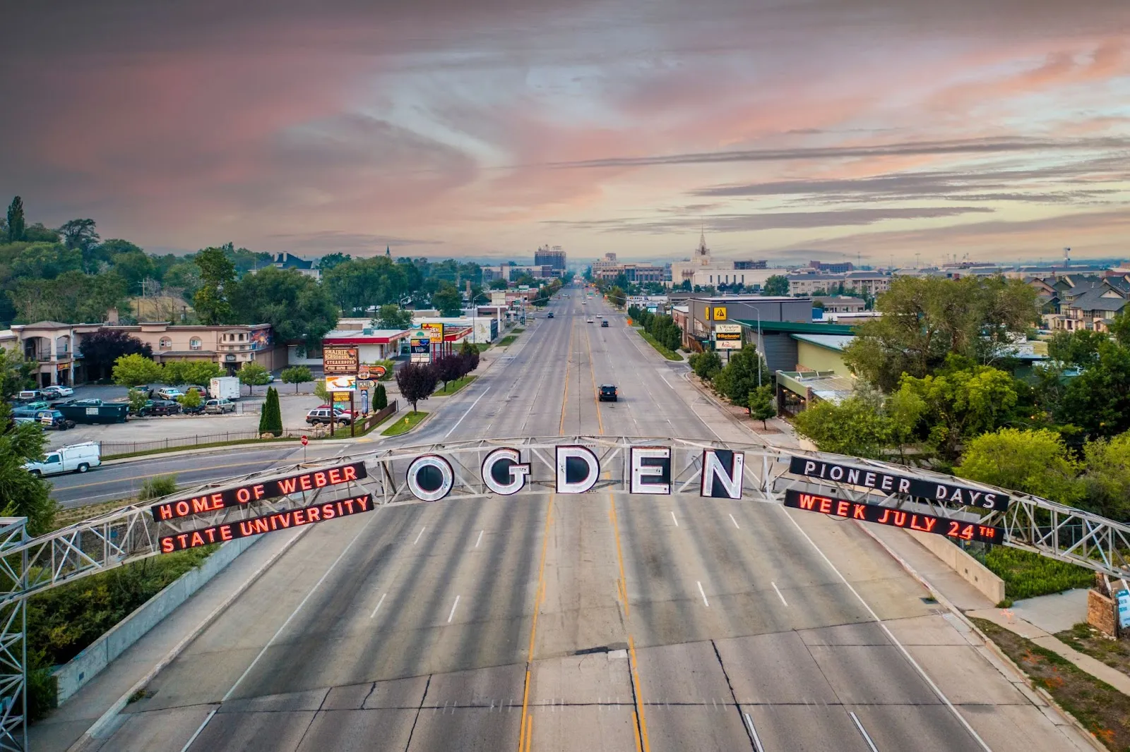 Oregon City sign above street in urban setting, family fun, Skinny Dogz in Ogden, family activities